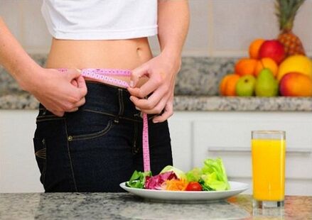 A girl who dieted to lose weight had her waist measured