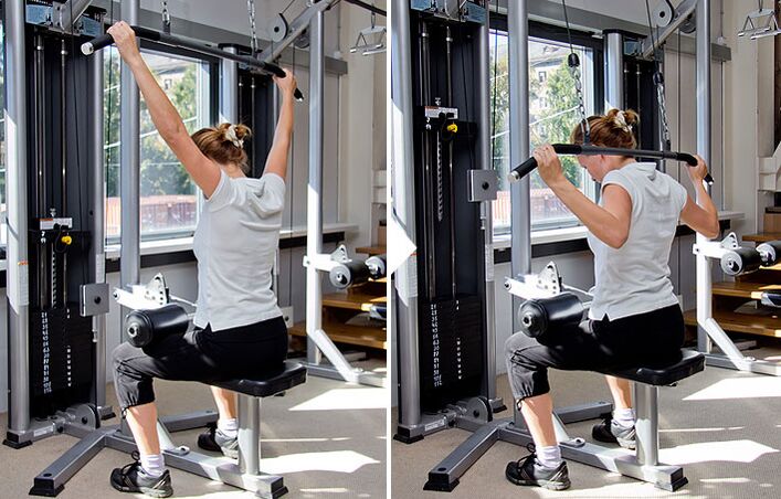 Pulling back on a block on the simulator helps build the lats